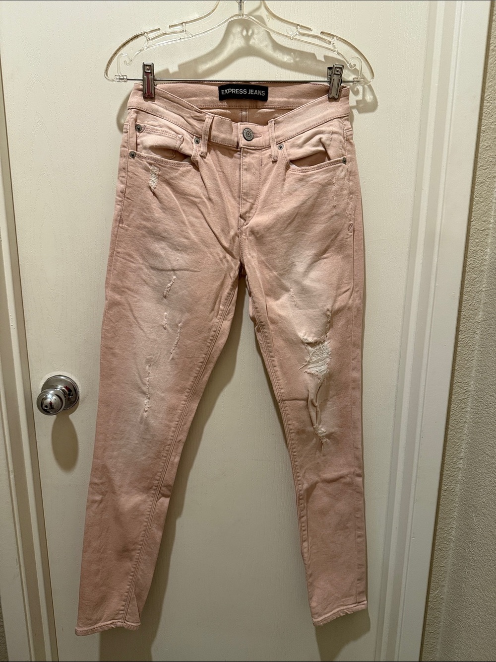 Express Light Pink Distressed Skinny Jeans
